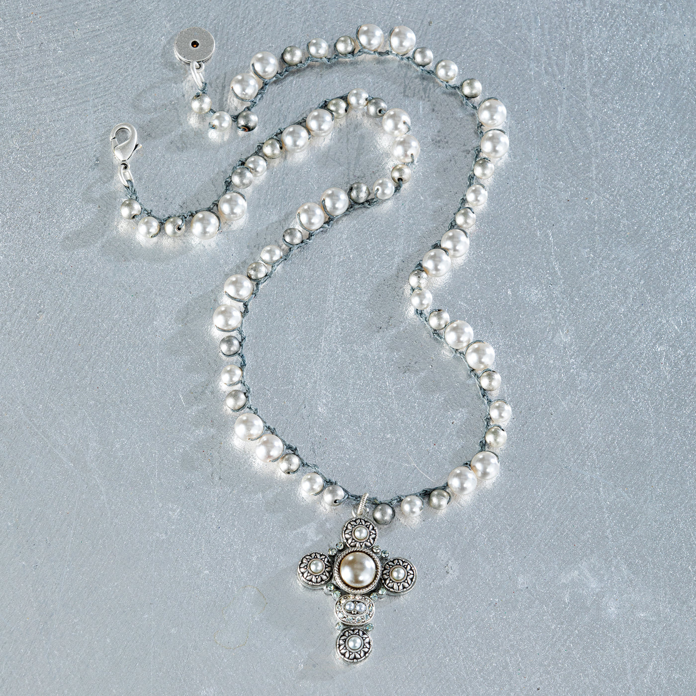 Charismatic Pearl Cross Necklace