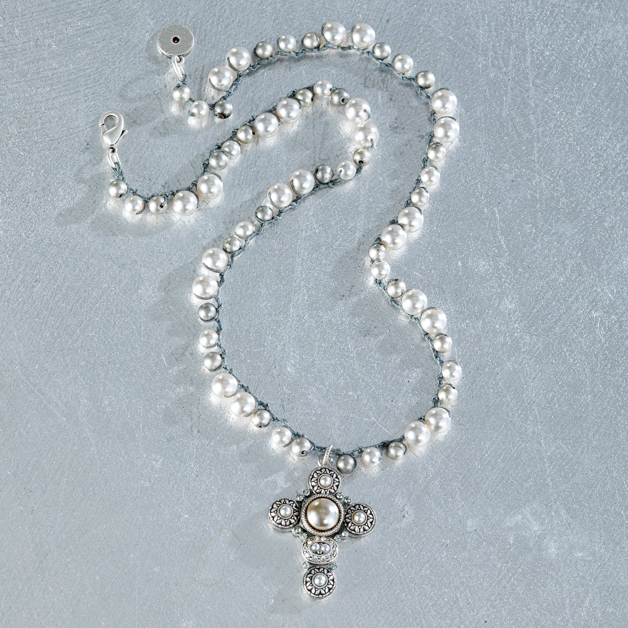 Charismatic Pearl Cross Necklace