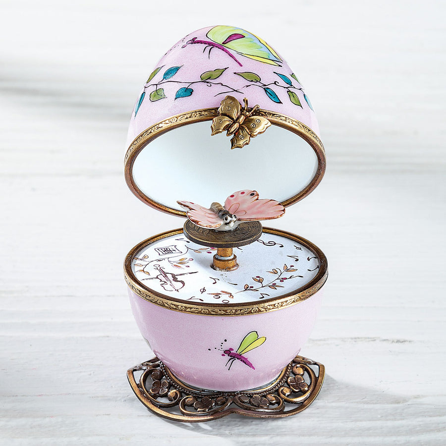 Limoges Porcelain Light Pink Musical Egg With Butterfly