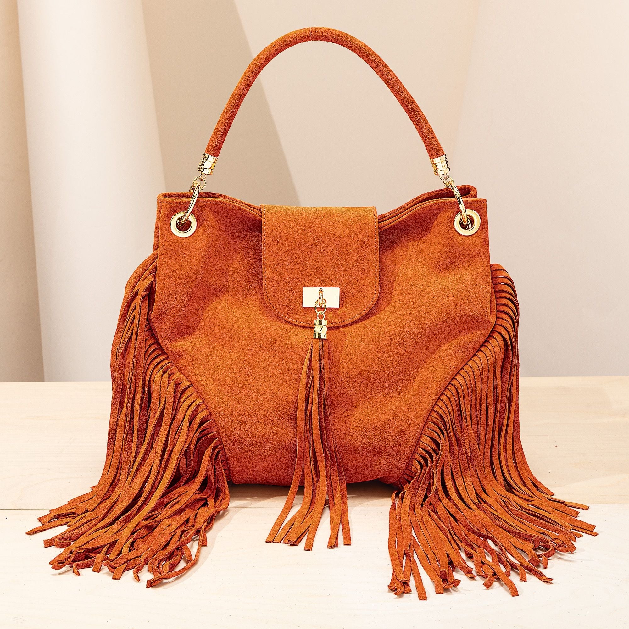 Shops UNO ALLA VOLTA genuine suede leather Italian made hobo bag with leather tassel