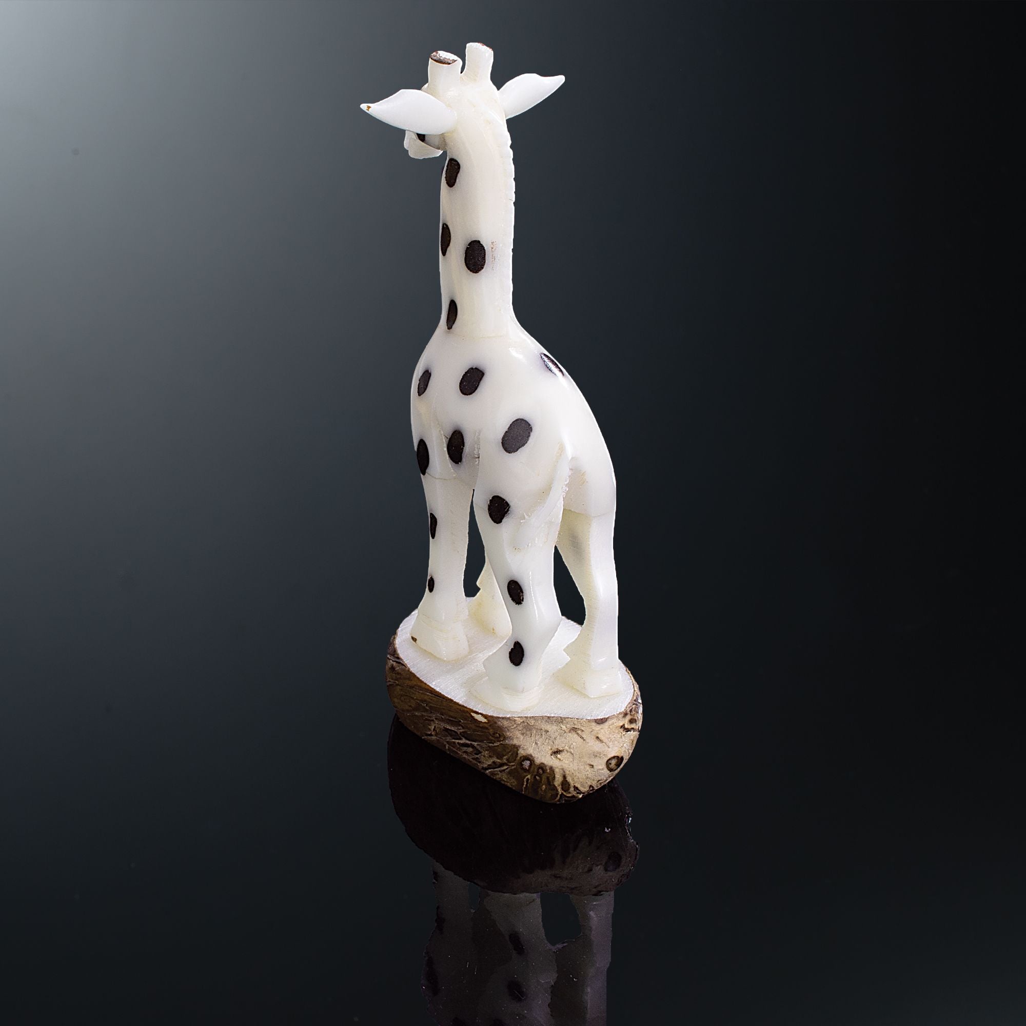 Hand carved giraffe selling